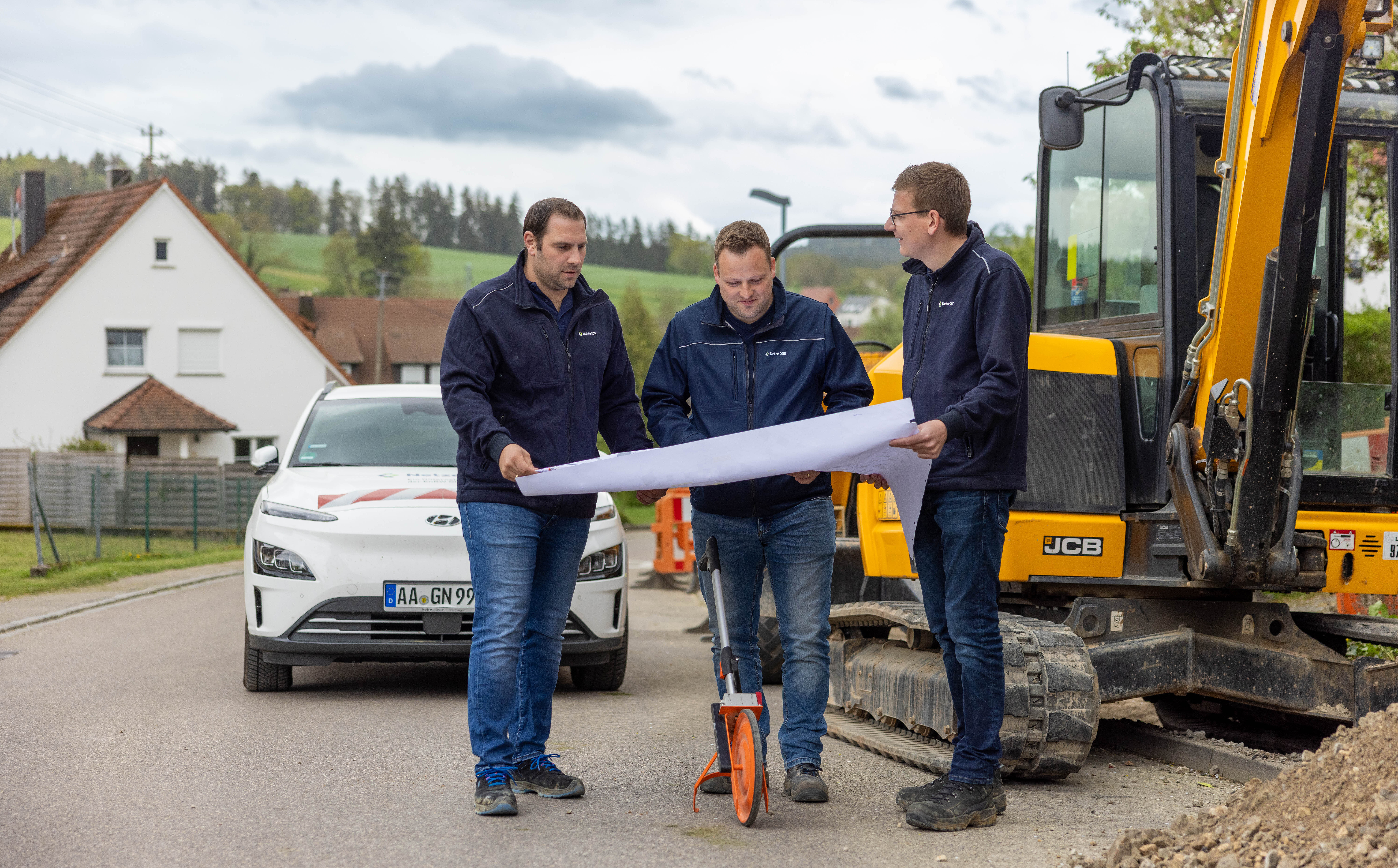 Planungsgespräch auf der Baustelle 